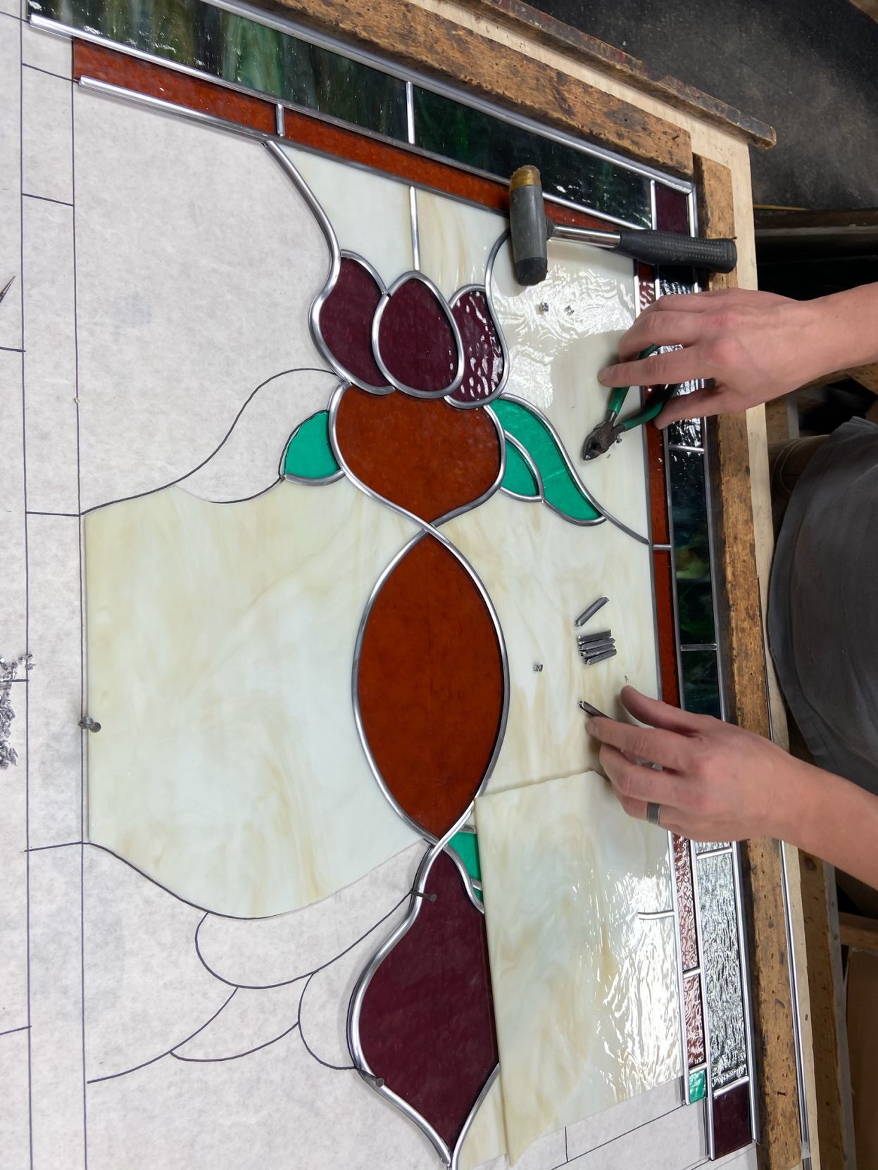 andrew hands working on glass